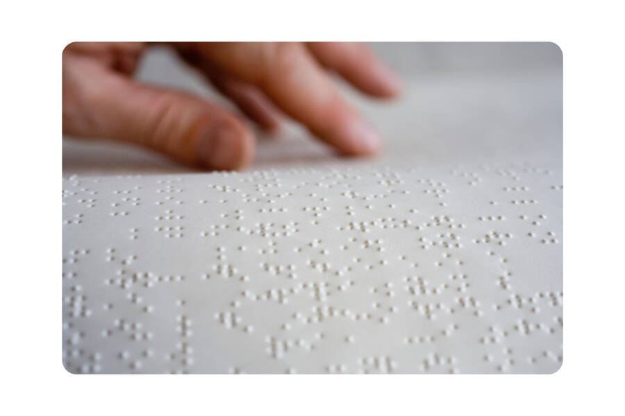Person reading Braille